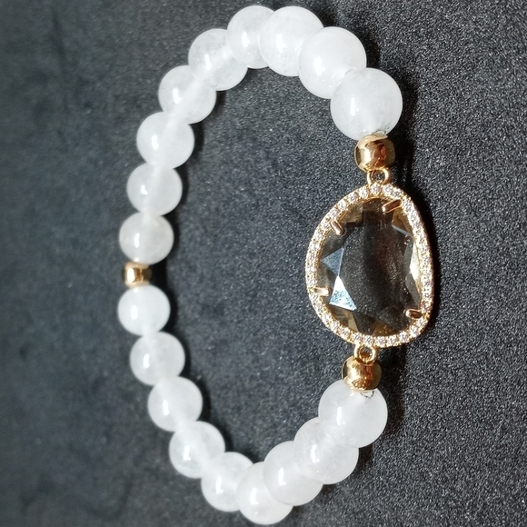 Moonstone bracelet with clear decorative Center and rhinestone accents. - Picture 1 of 4
